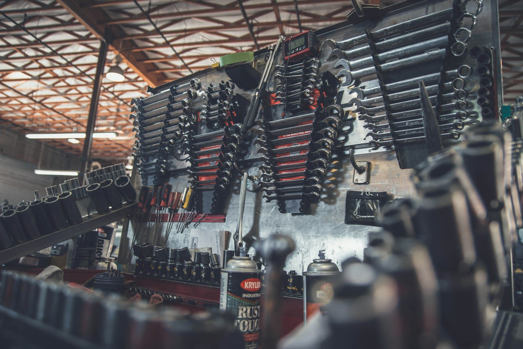 Mechanic tools laid out on a workbench